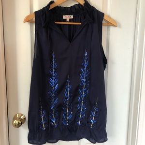 Sleeveless shirt with ruffle hem, sequin details